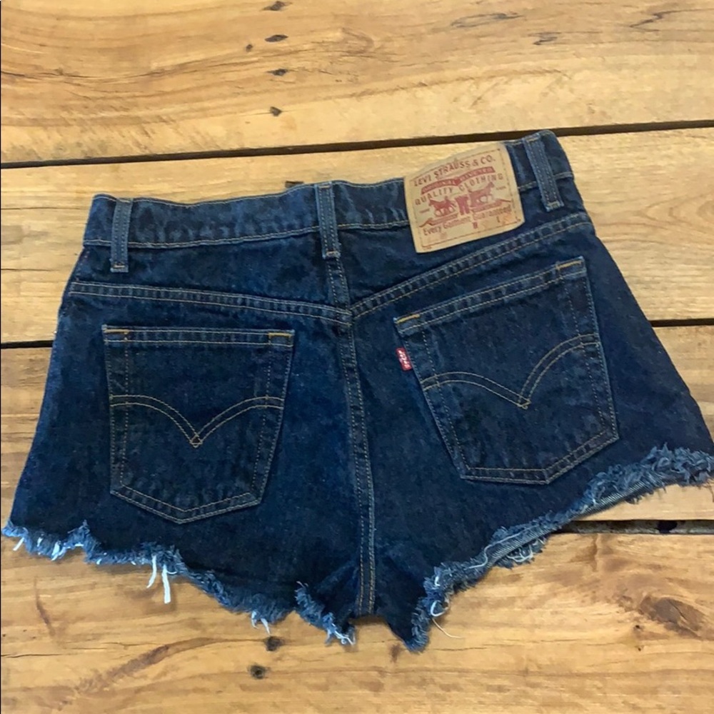 Vintage Levi cutoff shorts. Mid-waist, dark wash.